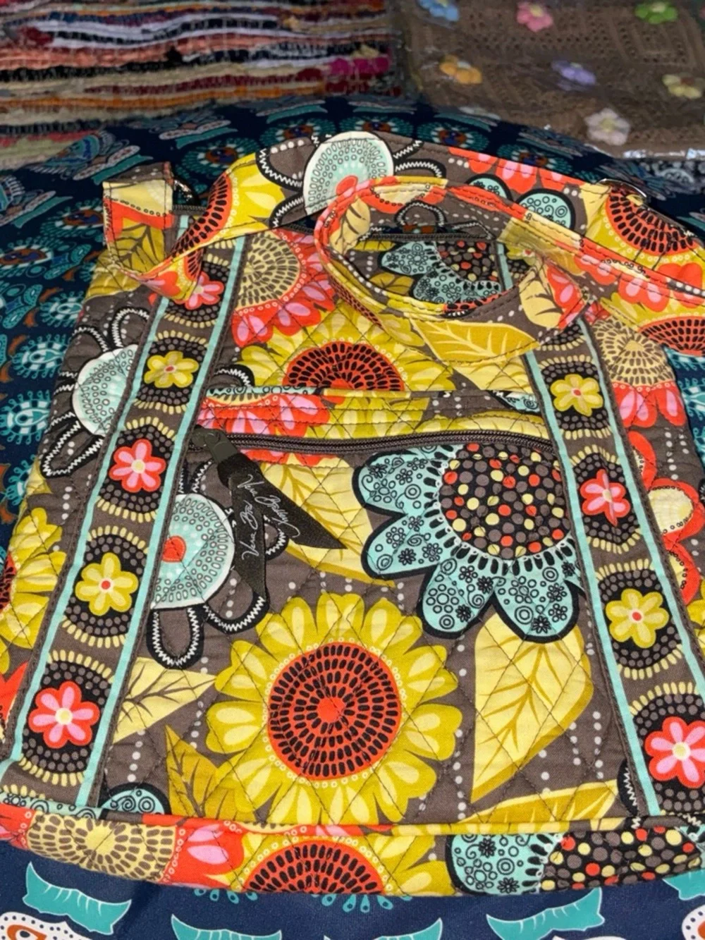 Vera Bradley Quilted Bag with Teal Floral Pattern on Brown